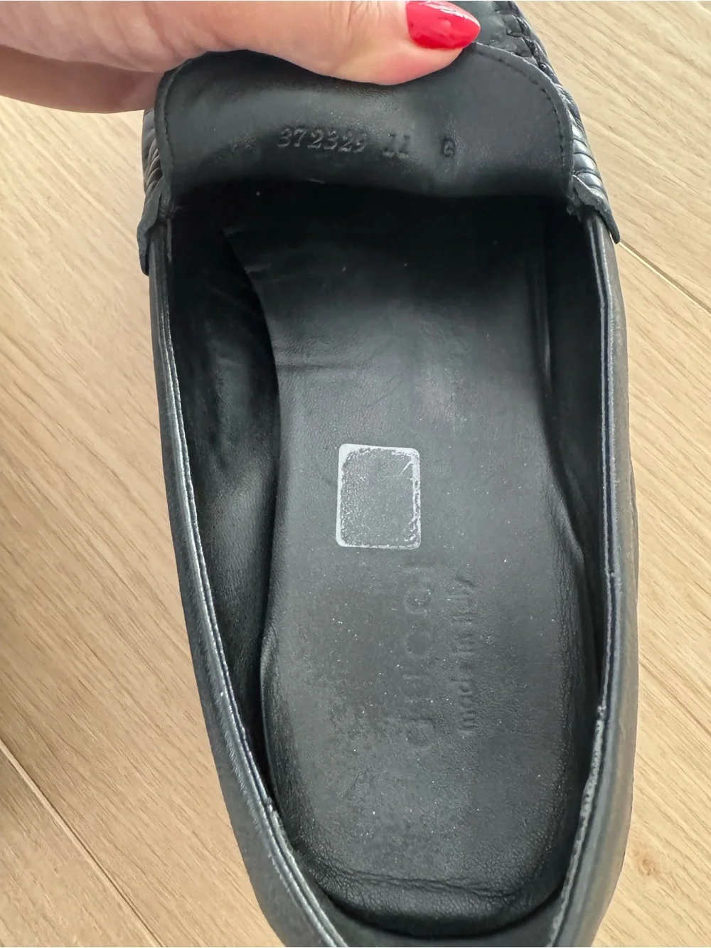 Gucci Black GG Embossed Leather Penny Loafers